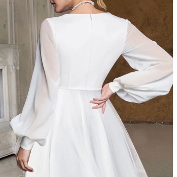 White Wedding Dress with Timeless Elegance - Picture 5 of 16